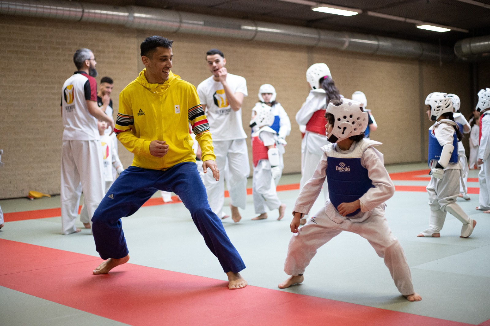 Trainer with students at Ketbi Taekwondo Academy - Mechelen, Sint-Katelijne-Waver and Loerenboske